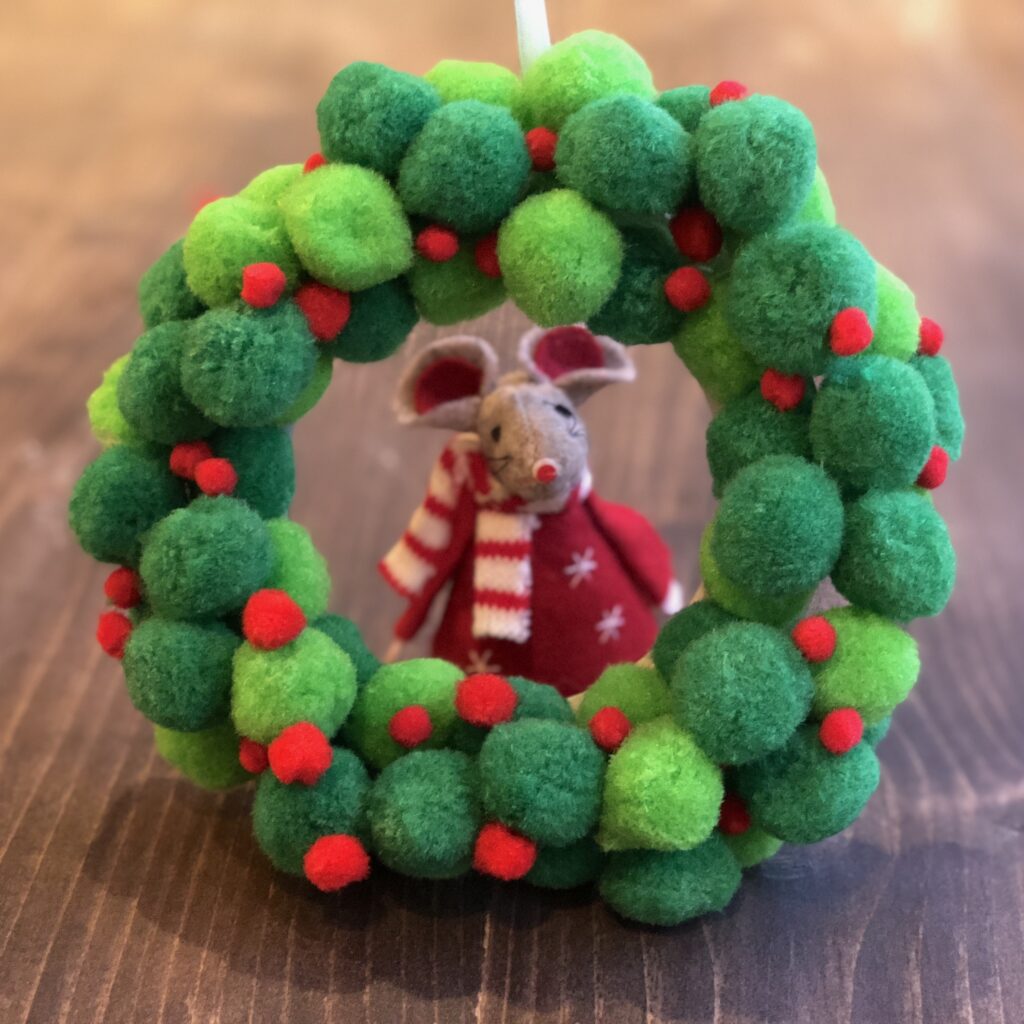 How to make a Pom Pom wreath for Christmas by International Elf Service