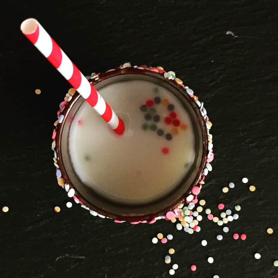 How to make Christmas Eve extra magical. Candy cane milk with sprinkles - perfect for Christmas Eve or a North pole breakfast!