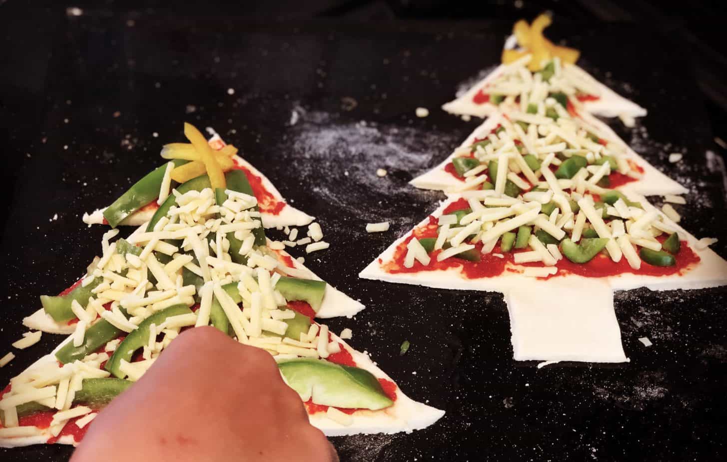 Easy Christmas Tree Pizza Recipe & Free printable templates to make homemade Christmas Tree & Christmas Star Pizzas from the International Elf Service