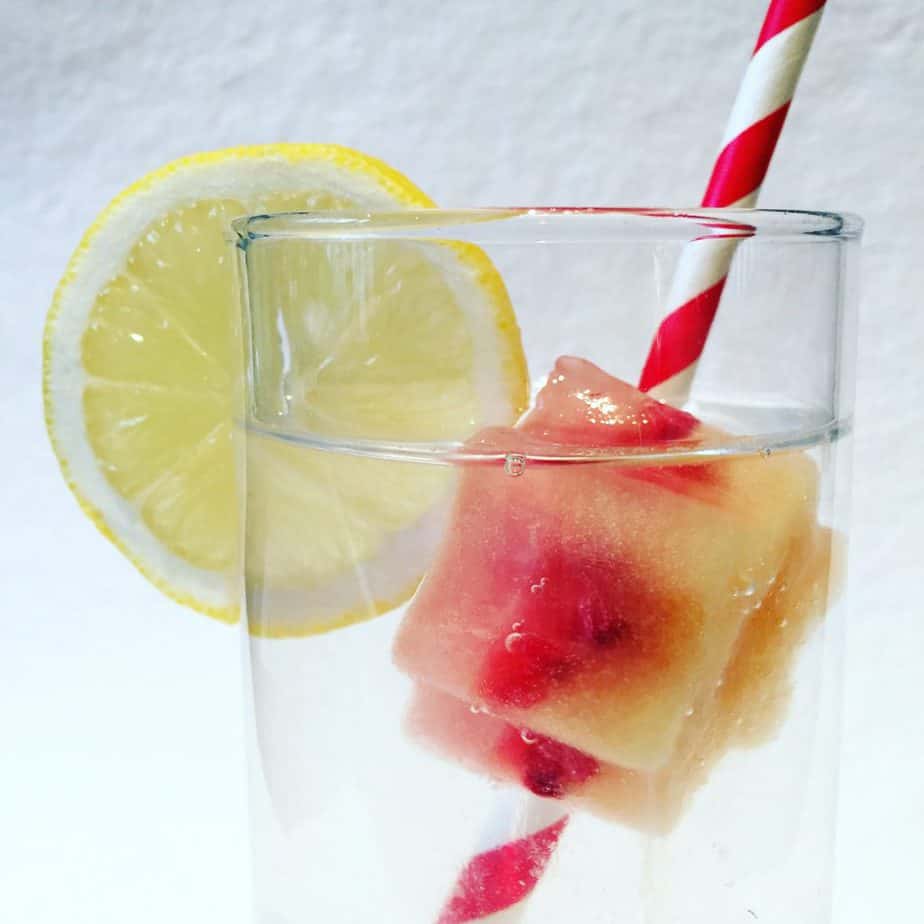 Beautiful layered watermelon & Pineapple Snowflake Ice Cubes. Perfect for kids' Christmas Cocktails!